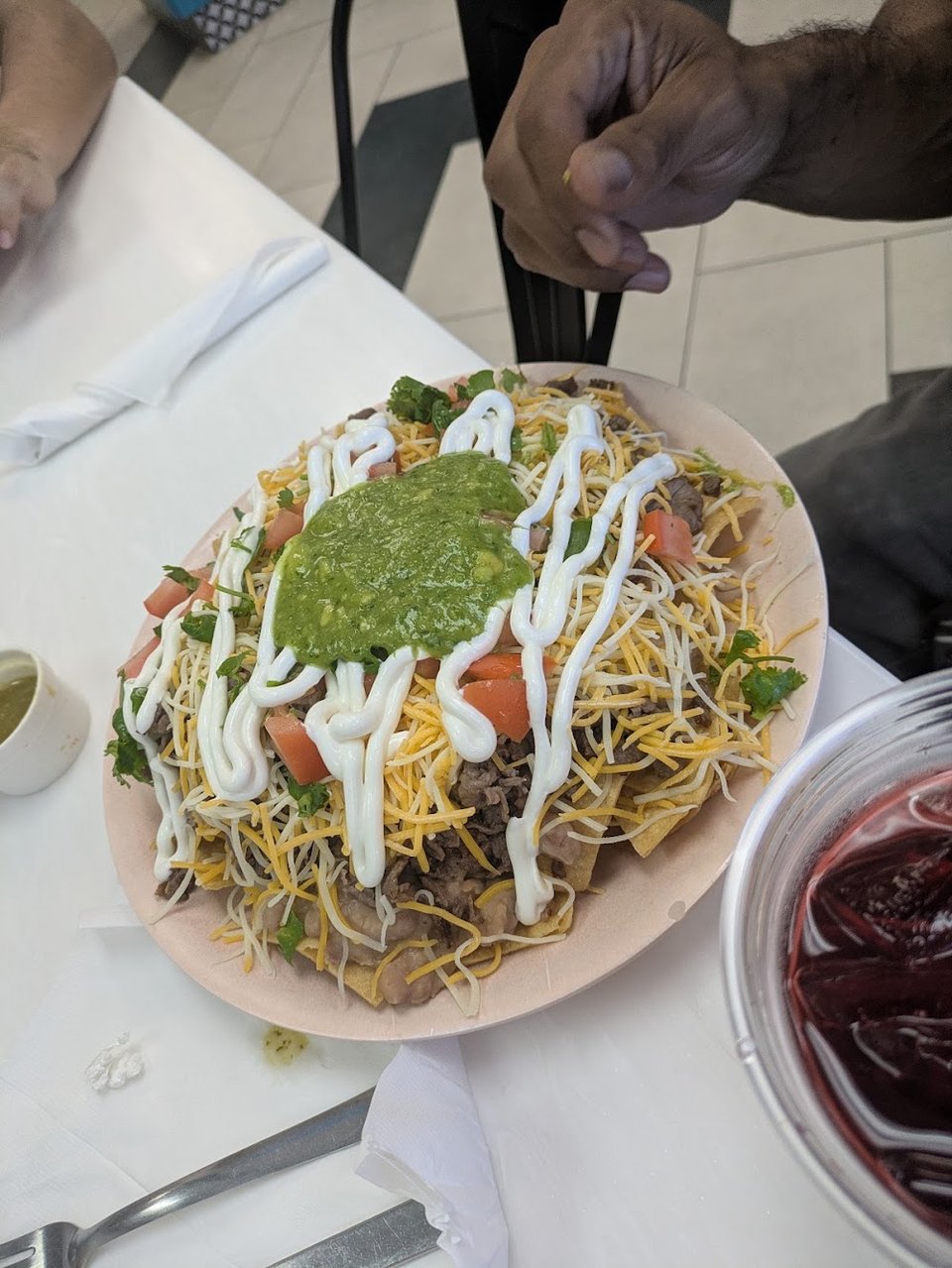 Printed menu with tacos and breakfast burritos